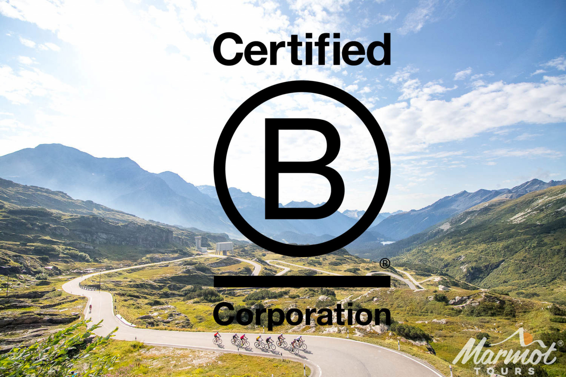 Group of cyclists climbing San Bernardino pass Dolomites with Marmot Tours and B Corp logo overlaid