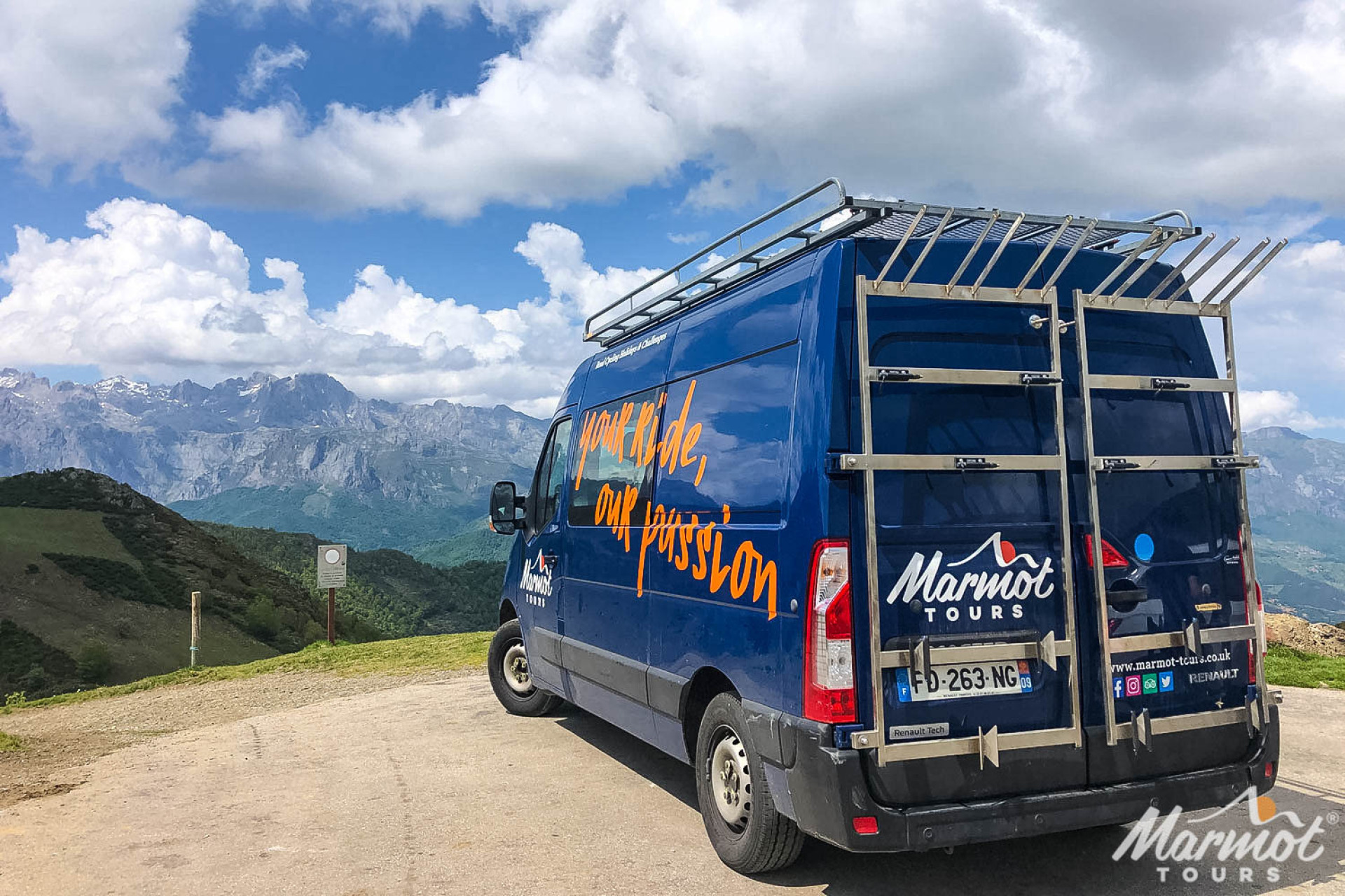 Marmot Tours road cycling holidays van with mountain view