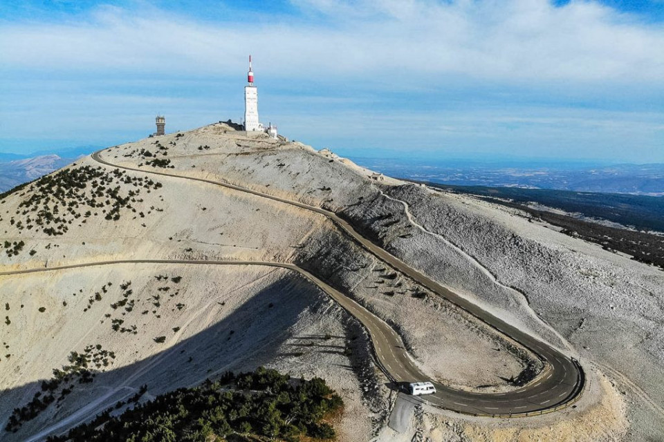 Aerial view of Mont Ventoux summit in sunshine on Marmot Tours full support road cycling holiday France Provence